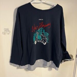 Beautiful navy blue top from a company called Springfield. It’s from Europe